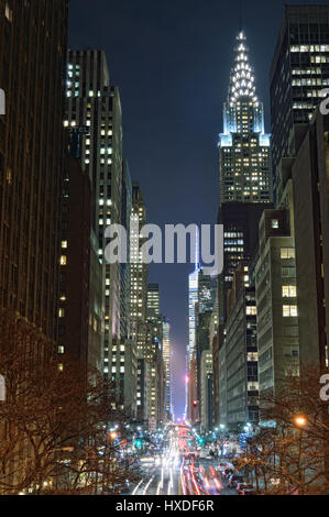 NYC streets at night. Midtown Manhattan - 42nd Street with Chrysler Building. Stock Photo