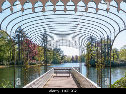 Romantic scaffold spanned by a graceful arcade in The Loo park in Apeldoorn in The Netherlands Stock Photo