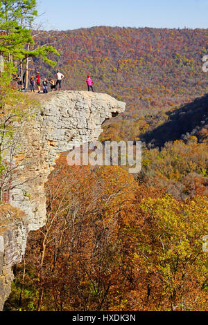 Hikers on Hawksbill Crag at Whittaker Point in the Upper Buffalo Wilderness Area of the Ozark Mountains. Stock Photo