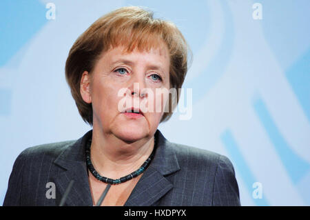 German Chancellor Angela Merkel and Israeli President Shimon Peres ...