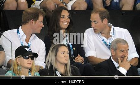 PRINCE HARRY THE DUCHESS OF CAMBRIDGE & THE DUKE OF CAMBRIDGE THE ROYAL FAMILY 28 July 2014 Stock Photo