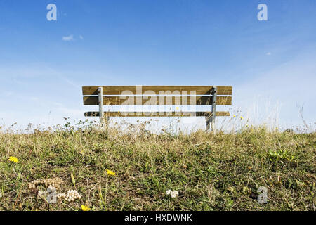 Desolate wooden bank on a dyke, Abandoned wooden bench on a dike |, Verlassene Holzbank auf einem Deich |Abandoned wooden bench on a dike| Stock Photo