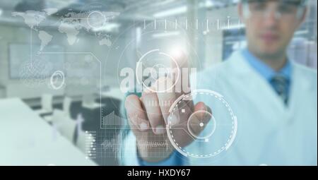 Digital composite of Man in lab coat pointing at white interface with flare against blurry lab with teal overlay Stock Photo