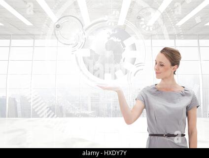 Digital composite of Woman with open palm hand under world earth globe interface Stock Photo