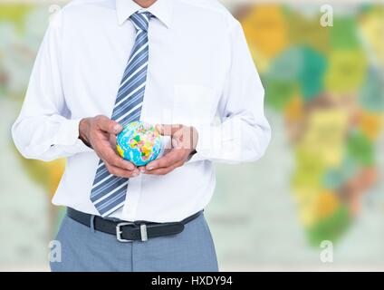 Digital composite of Travel agent mid section holding globe against blurry map Stock Photo