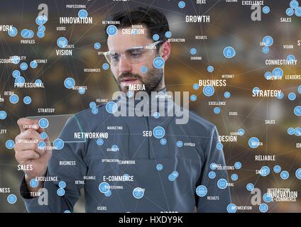 Digital composite of Man with glass tablet against Night city with connectors Stock Photo