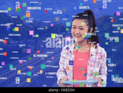 Digital composite of Young woman with tablet against Night city with connectors Stock Photo