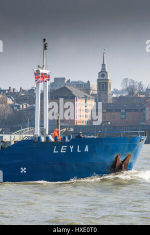 The general cargo ship LAYLA steaming upriver on the River Thames in the UK. Stock Photo