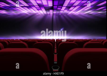 Digital composite of 3d composition of cinema seats facing to screen with abstract background Stock Photo