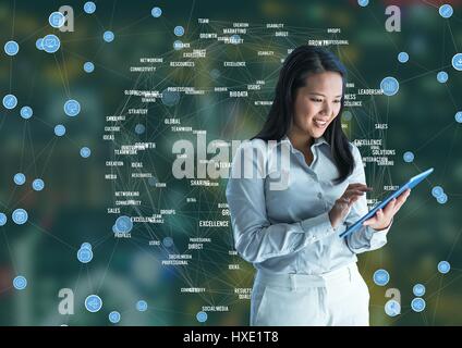 Digital composite of Woman with tablet against Night city with connectors Stock Photo