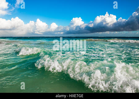 Waves crashing on the beach Stock Photo