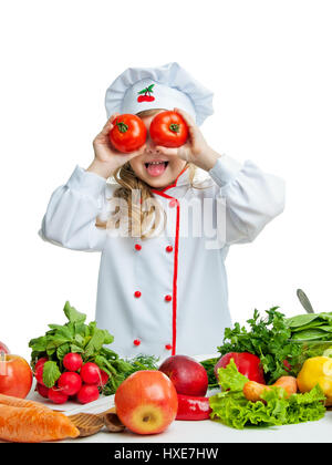 Child 5-6 years preparing food. Stock Photo