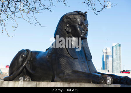 One of the two bronze Sphinxes which flank Cleopatra's needle on the Victoria Embankment, River Thames, London, Uk Stock Photo