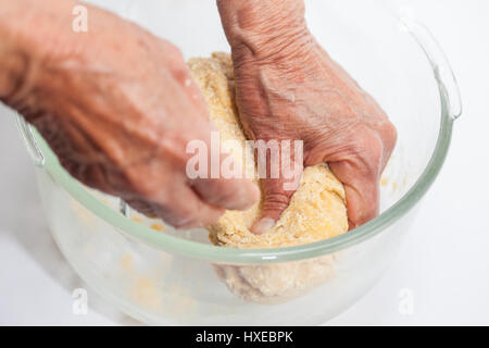 Ravioli Preparation : Kneading pasta dough by hand Stock Photo