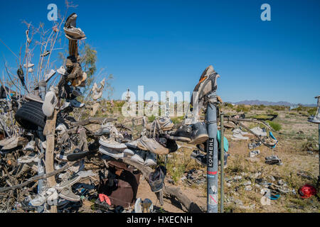 Shoe garden, Rice, California. Rice became noted for its Rice Shoe Tree, a lone tamarisk on a turnout just south of highway CA 62. For reasons unknown Stock Photo