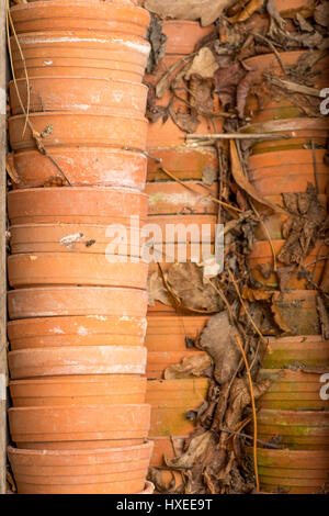 empty old retro terracotta pots Stacked on top of each other Stock ...