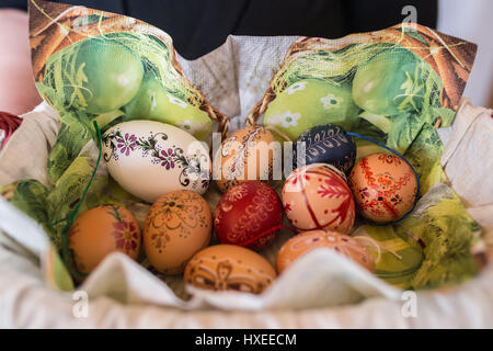 A basket of beautiful, painted eggs, a cultural tradition in Easter in Hungary. Stock Photo