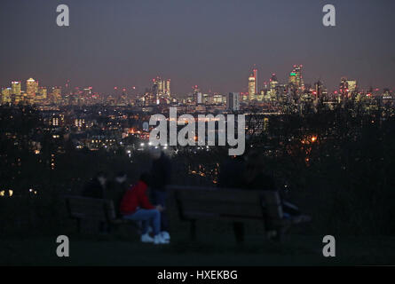 A view of the London skyline at night from Parliament Hill, Hampstead Heath, north London. Stock Photo
