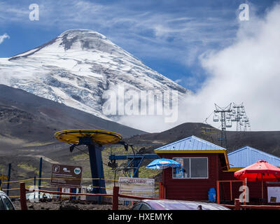 Ski lift on the slope of volcano Osorno, ski center, next to cafeteria and other tourist services, chilean lake district,  Chile Stock Photo