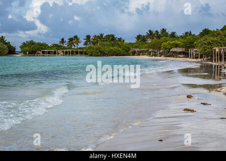 Turquoise water meets the white sandy coast of Cayo Coco shortly after sunrise in Cuba. Stock Photo