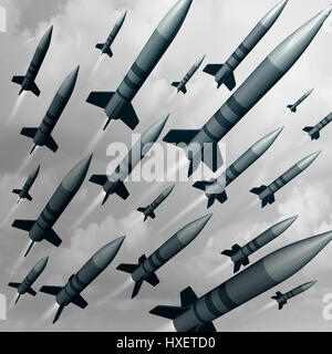 Missile weapon attack as a nuke or nuclear war threat concept as a group of ballistic bombs being launched for destruction. Stock Photo