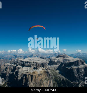 Paragliders, paragliding above Sella group, Sella Towers and Piz Boe, Dolomites, Val di Fassa, Trentino Province, Italy Stock Photo