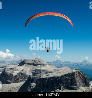 Paragliders, paragliding above Sella group, Sella Towers and Piz Boe, Dolomites, Val di Fassa, Trentino Province, Italy Stock Photo