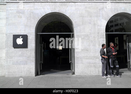 The Apple retail store in Berlin is located at the prestigious street Kurfürstendamm and has the classical Apple brand logotype placed next to the ent Stock Photo