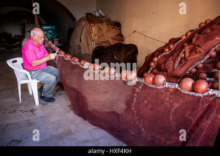 SCIACCA, ITALY - October 18, 2009: Fisherman in Sciacca, Italy. Sciacca is known as the city of thermal baths since Greek Stock Photo