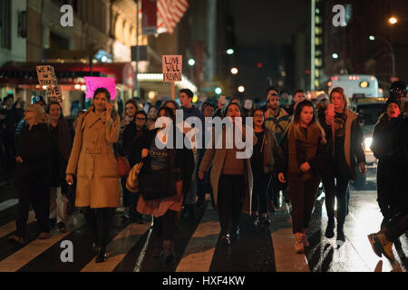 Trump protesters block traffic and head down 57th Street on the way to Trump Tower. 11/09/2016 NYC Stock Photo