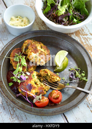 Fish cake with green  salad. Stock Photo