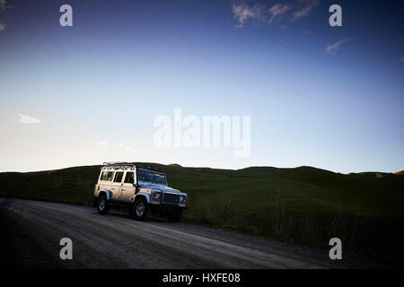 farmers off road 4-4 driving checking stock on farm Stock Photo