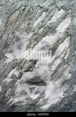 Grey wall with scratches background concept, with white smoke effect in the middle and rough concrete pattern from borders Stock Photo