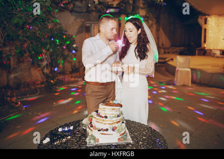 cutting the wedding cake Stock Photo