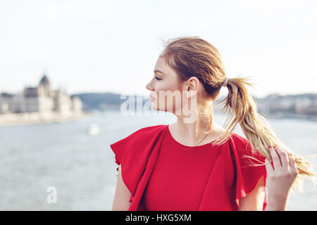 Yong girl looking Budapest parlament Stock Photo