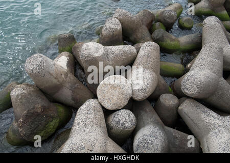 Concrete sea stability defences at Funchal harbour Madeira Stock Photo