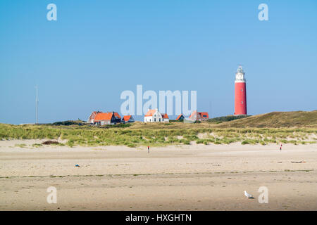 Beach, dunes and lighthouse of De Cocksdorp on West Frisian Waddensea island Texel, Netherlands Stock Photo