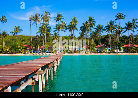 Tropical Resort. boardwalk on beach Stock Photo