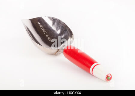Antique metal flour scoop isolated on white background Stock Photo
