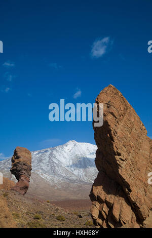 Looking towards El Teide Volcano on Tenerife with the Los Roques de Garcia in the foreground. Stock Photo