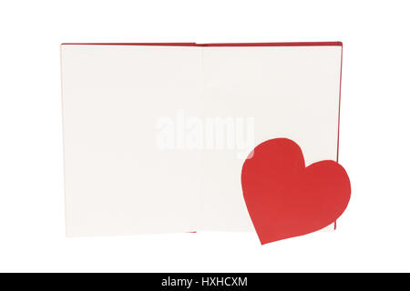 Paper heart bookmark on blank open book isolated on white background Stock Photo