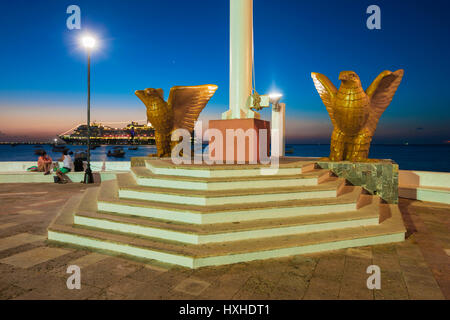 Statue of two golden eagles and in San Miguel on Isla de Cozumel island, Mexico Stock Photo
