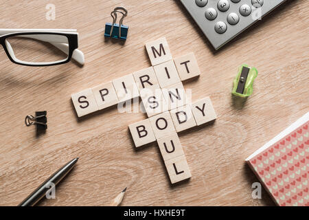 Spirit soul mind and body words made of wooden cubes Stock Photo