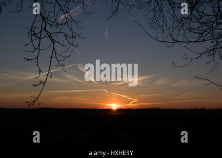 Sundown on the first of spring in Friesland, Netherlands Stock Photo