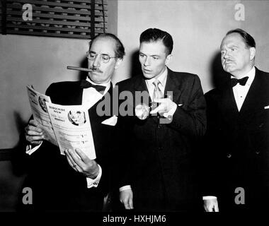 GROUCHO MARX, HOWARD FREEMAN, FRANK SINATRA, DOUBLE DYNAMITE, 1951 Stock Photo