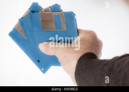 Hand of a woman holding floppy disks Stock Photo