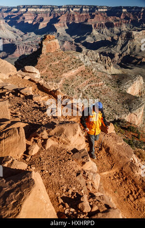 Hiker descending South Kaibab Trail, Grand Canyon National Park, Arizona Stock Photo