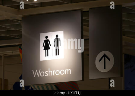 Close up man and woman washroom logo inside Ikea store Stock Photo