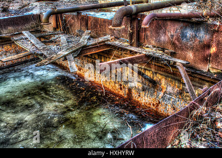 Old gas steel boilers established in old boiler-house Stock Photo