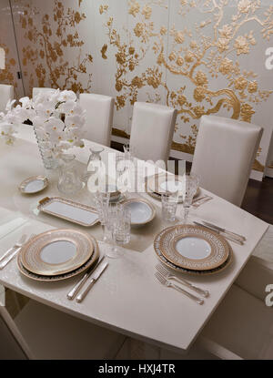 White-gold dining room in a luxury apartment in London Stock Photo